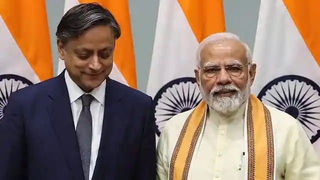 pm_narendra_modi_and_shashi_tharoor_1754037341145_1754037341333